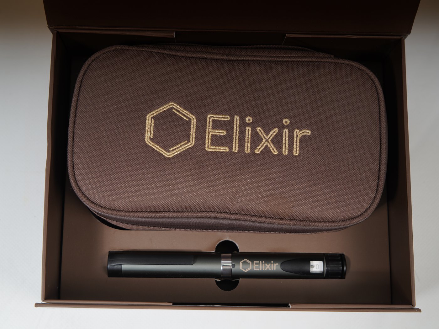 The gift box opened — the bag and pen inside