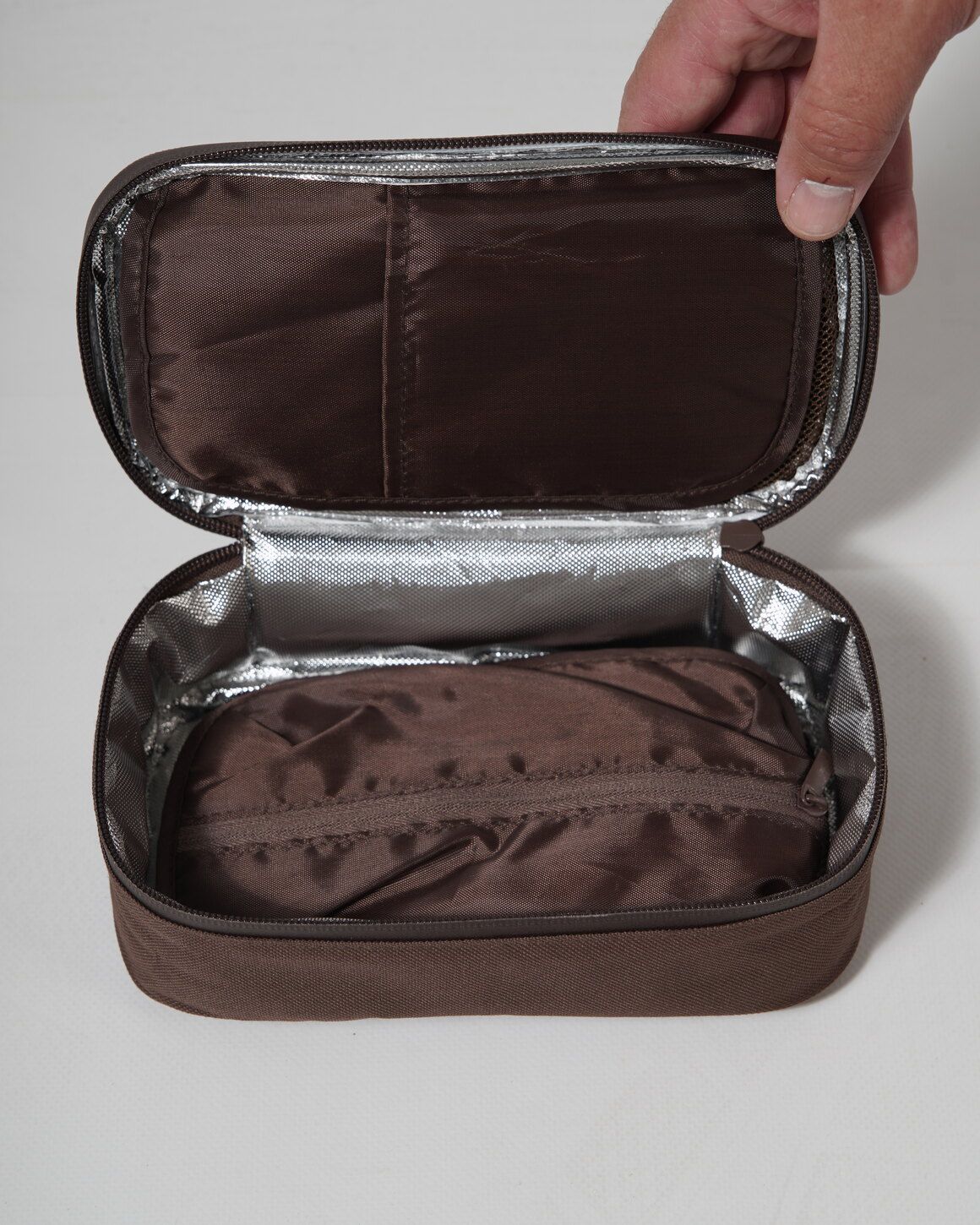 The Elixir cooling bag open, showing its insulated foil lining and interior pocket