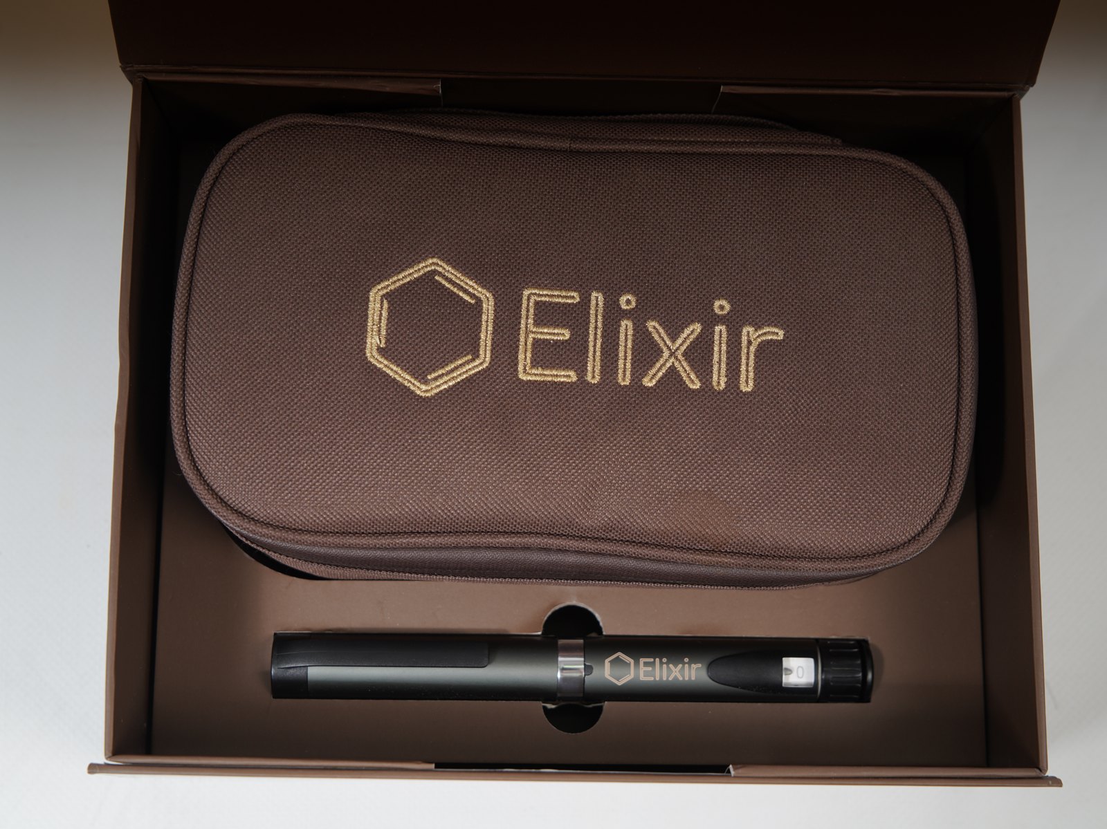 The Elixir Starter Kit — the gift box with the bag and pen inside